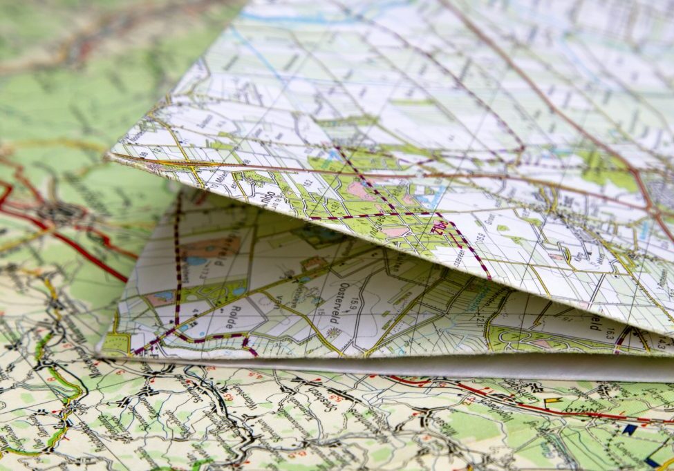 Close up or macro of folded road maps, shallow depth of field